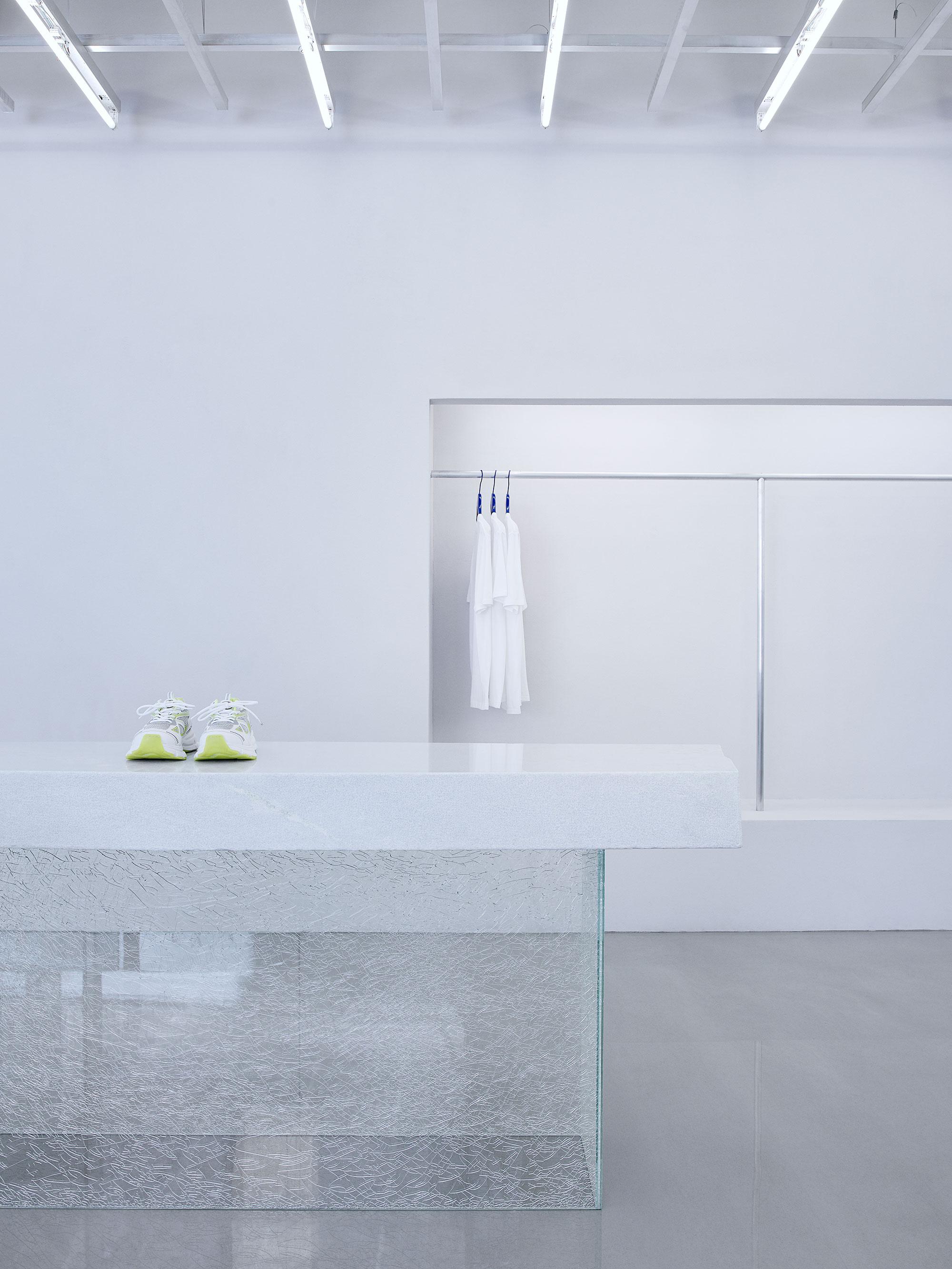 Interior design by Halleroed for Axel Arigato in Biblioteksgatan 7, Stockholm — image 5 of 7