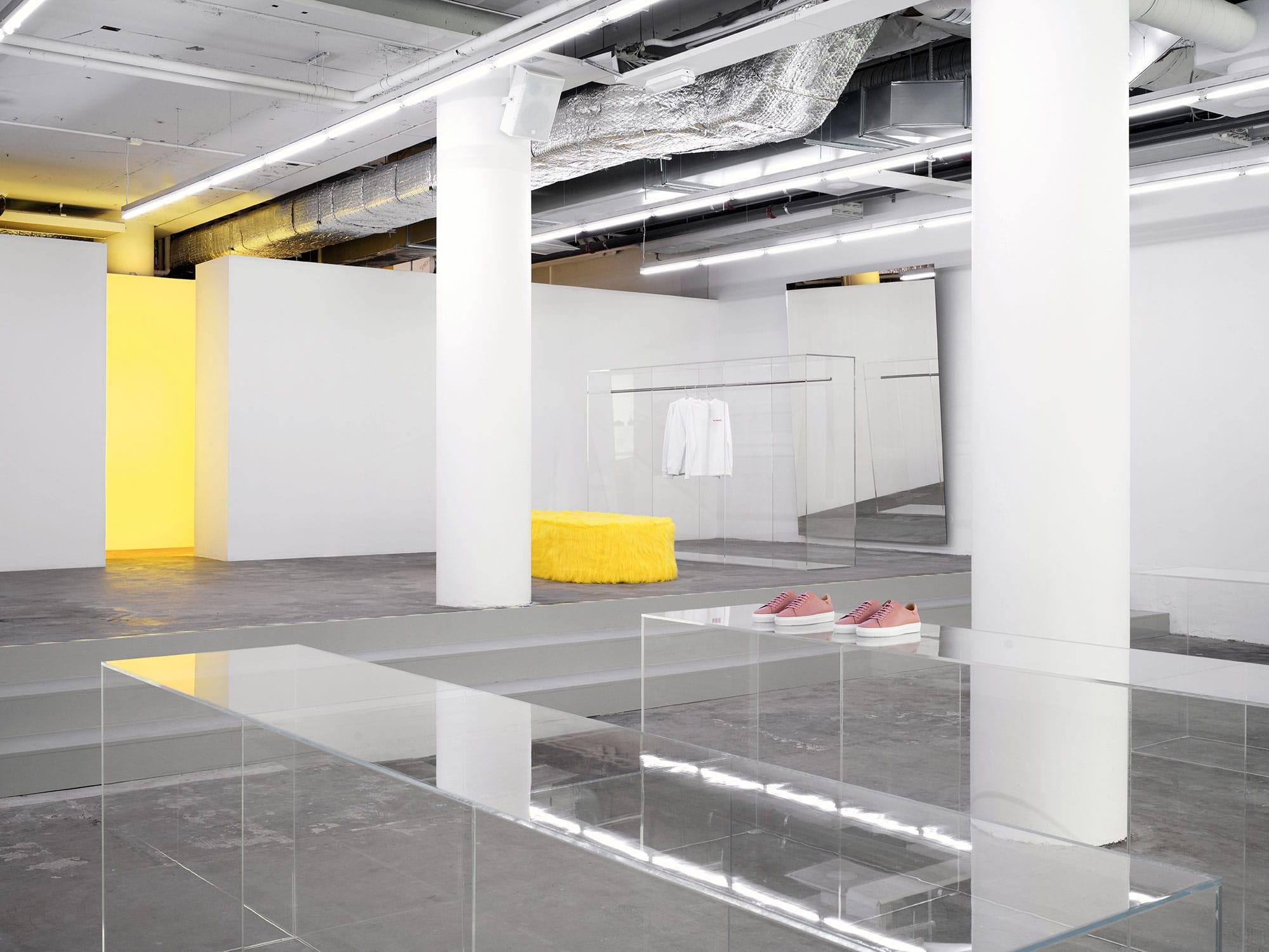 Interior design by Halleroed for Axel Arigato in Norrmalmstorg, Stockholm — image 2 of 9