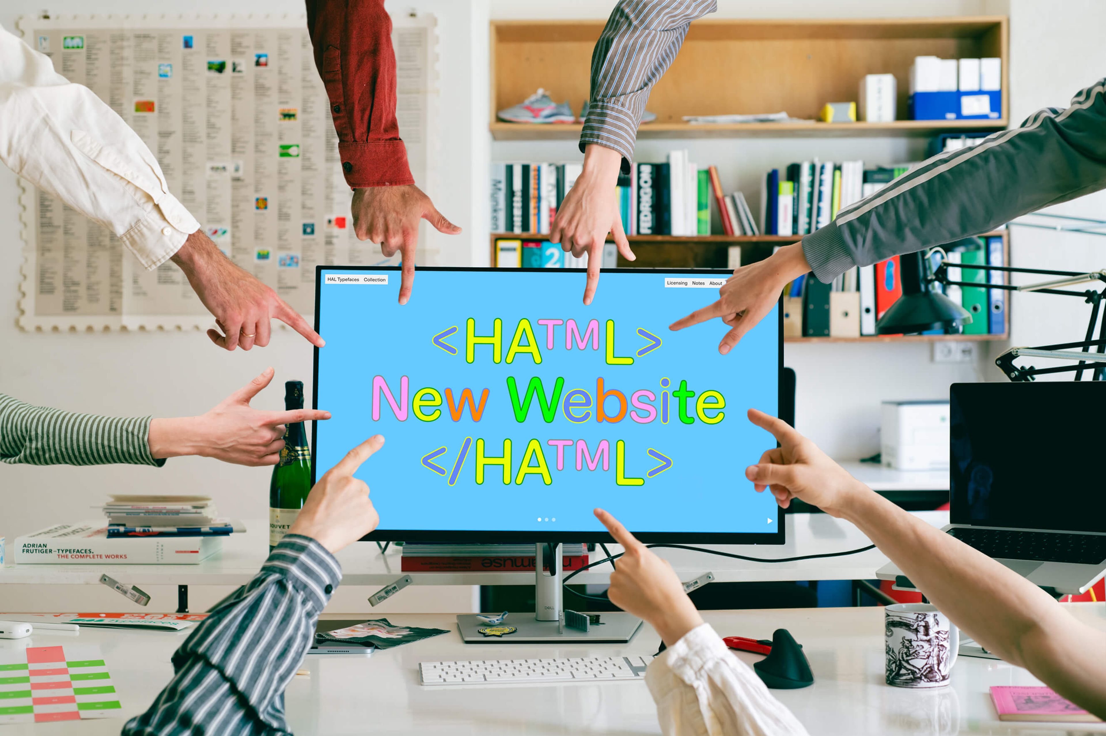 hands pointing at new website
