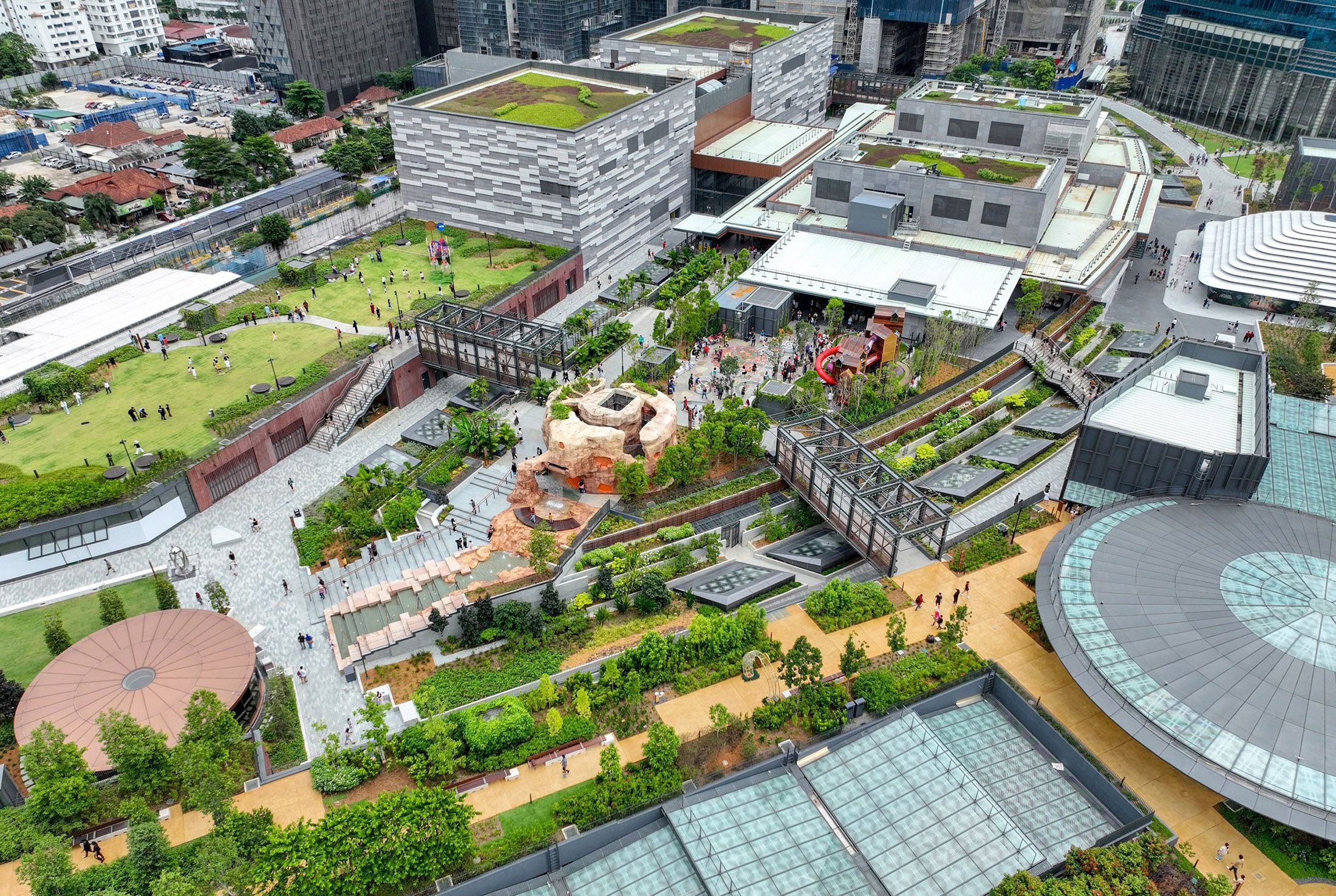 A photo of a very large rooftop park taken from above.