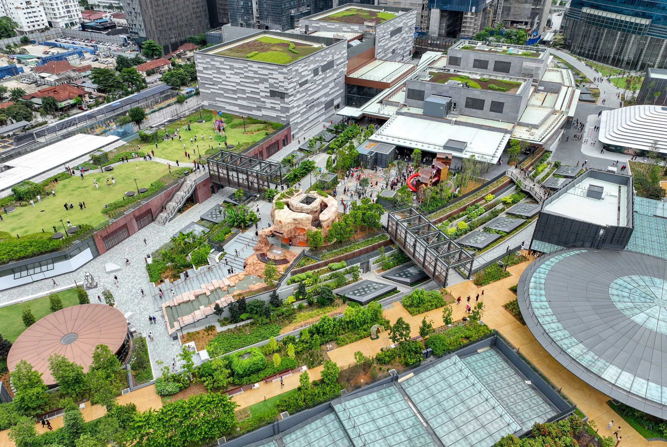 A photo of a very large rooftop park taken from above.