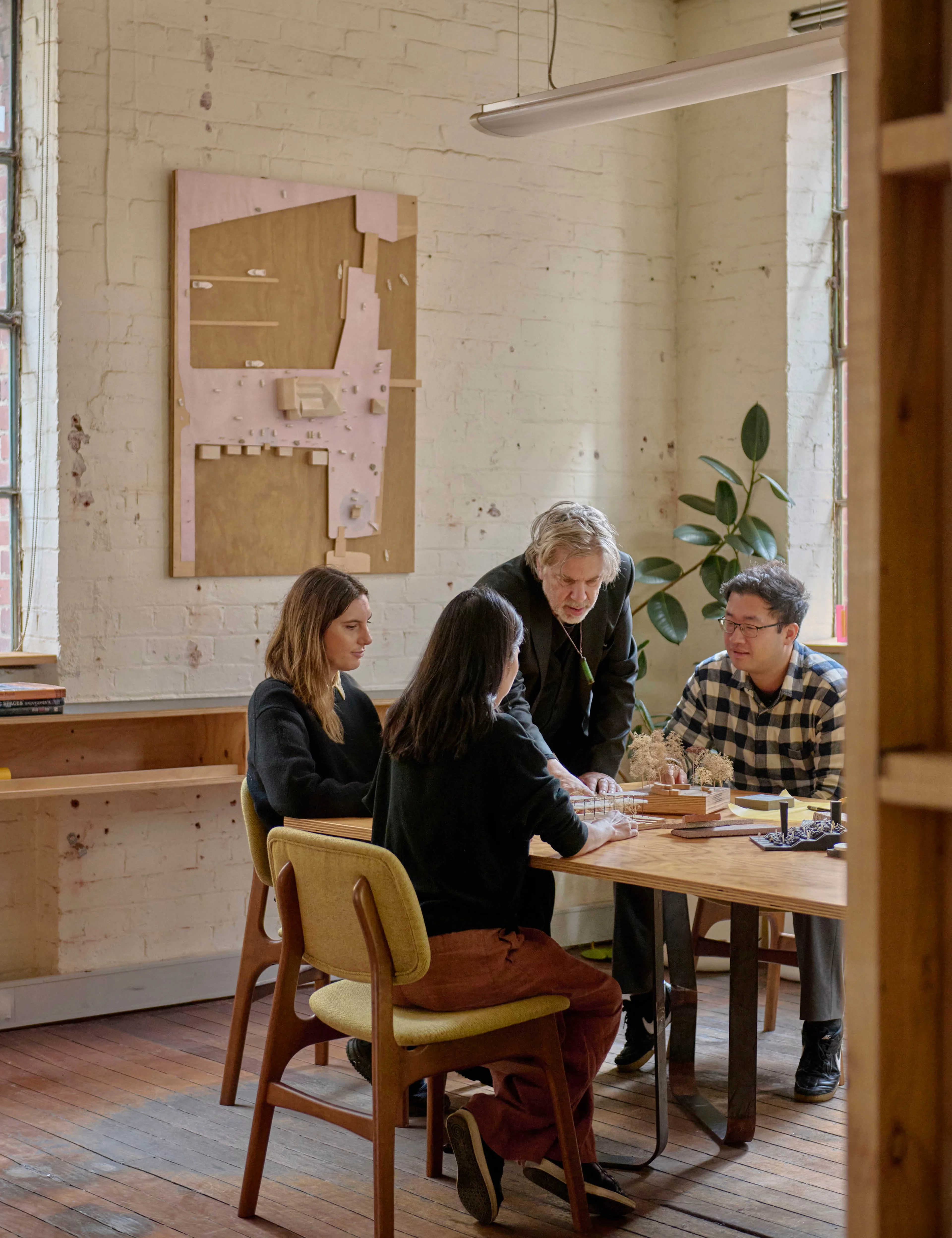 Four individuals in the OCULUS studio in Melbourne.