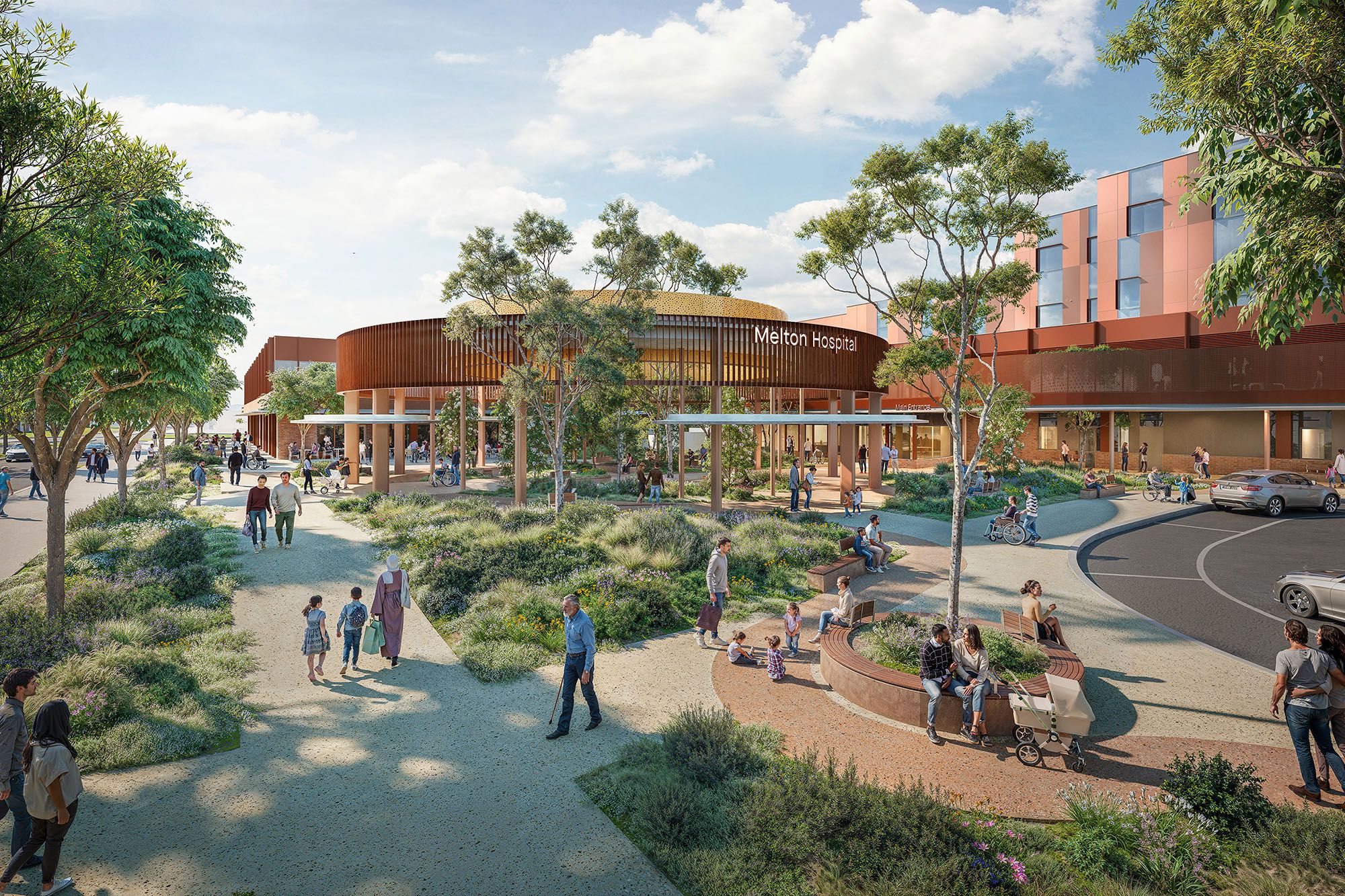 An architectural visualisation of a new hospital forecourt filled with plants, trees, and wide paths. There are diverse groups of people dispersed throughout. 