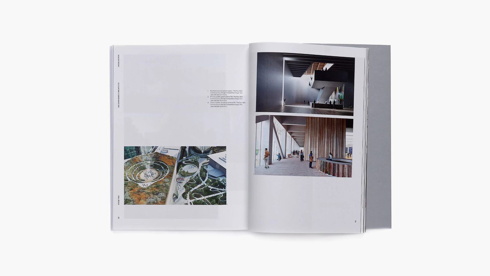 A coloured photograph of an open book on a white background. The spread features three renders of a contemporary gallery, with some tiny text, and lots of white space on the pages.