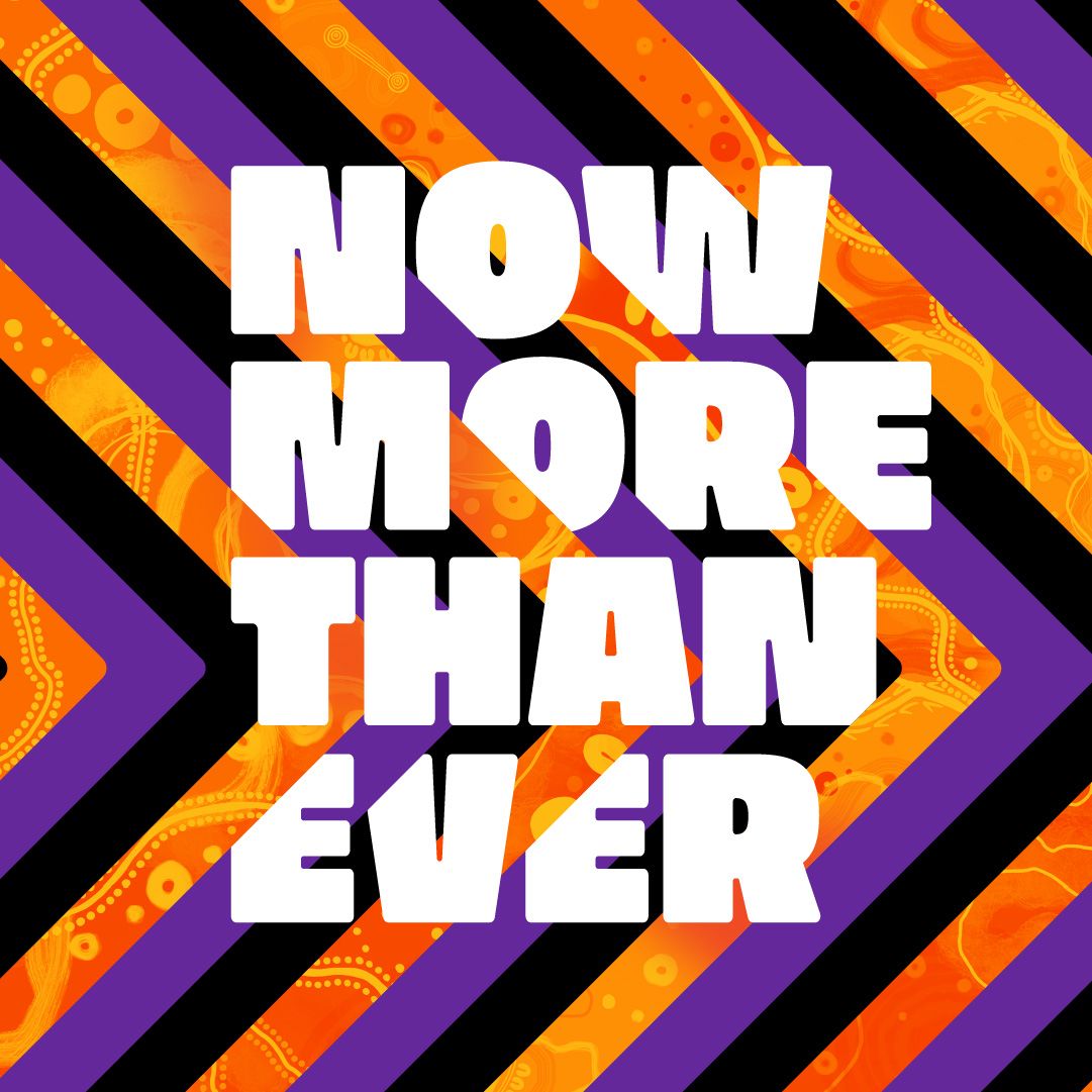 A purple, orange, and black chevron graphic with bold white text that reads "now more than ever."