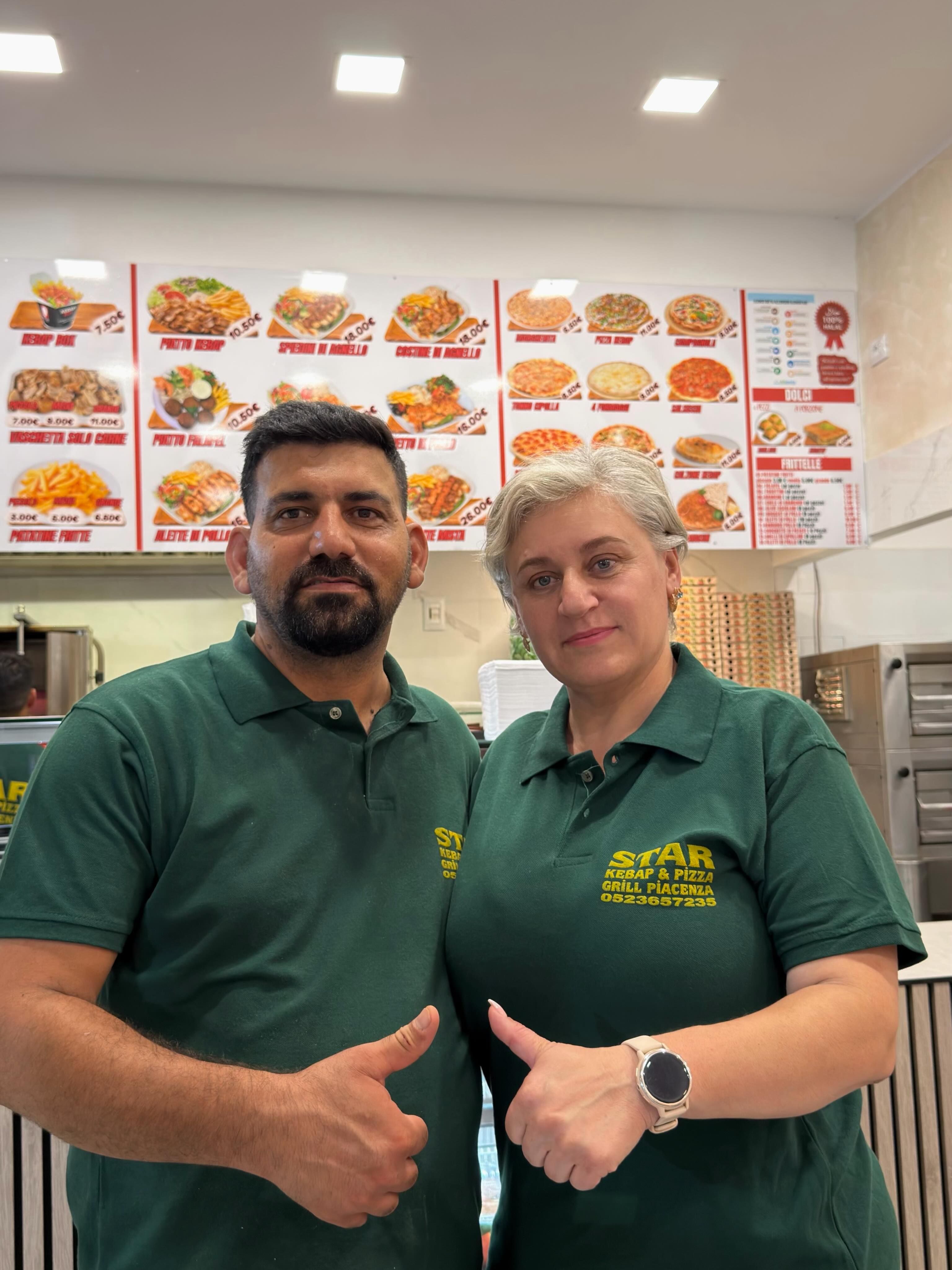 I titolari di Star Kebap Pizza Grill nel locale