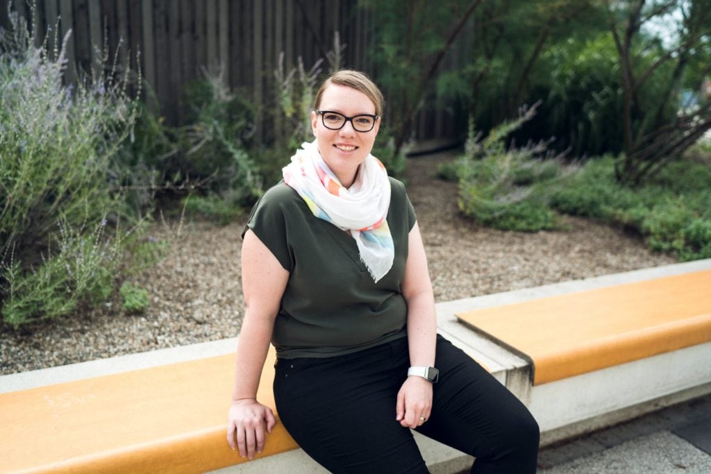 Rebecca sitting outside