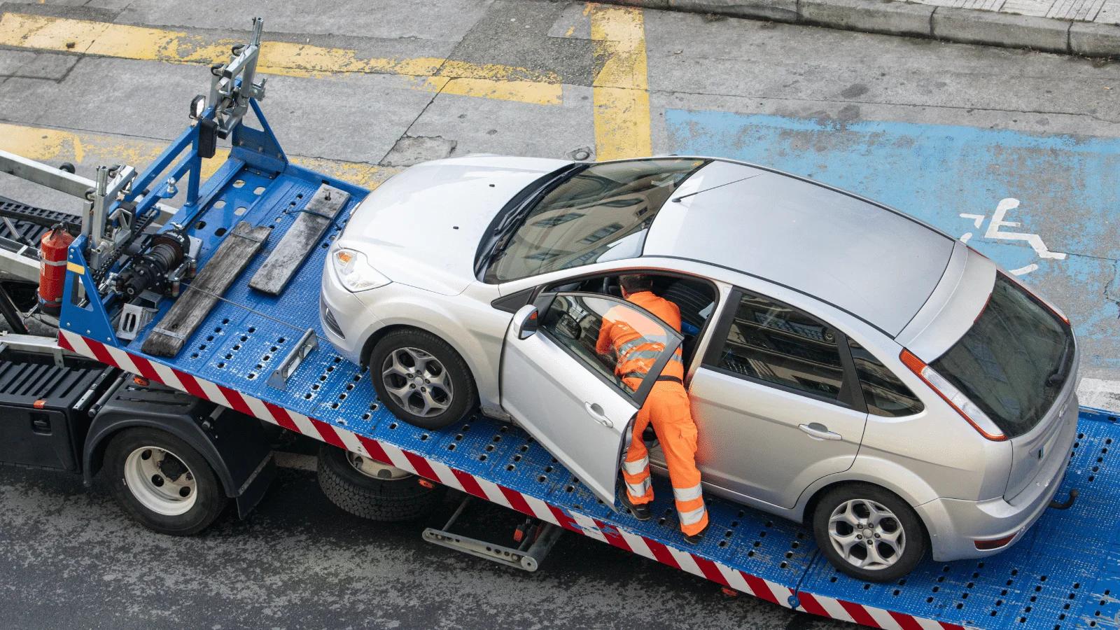 tow truck towing car