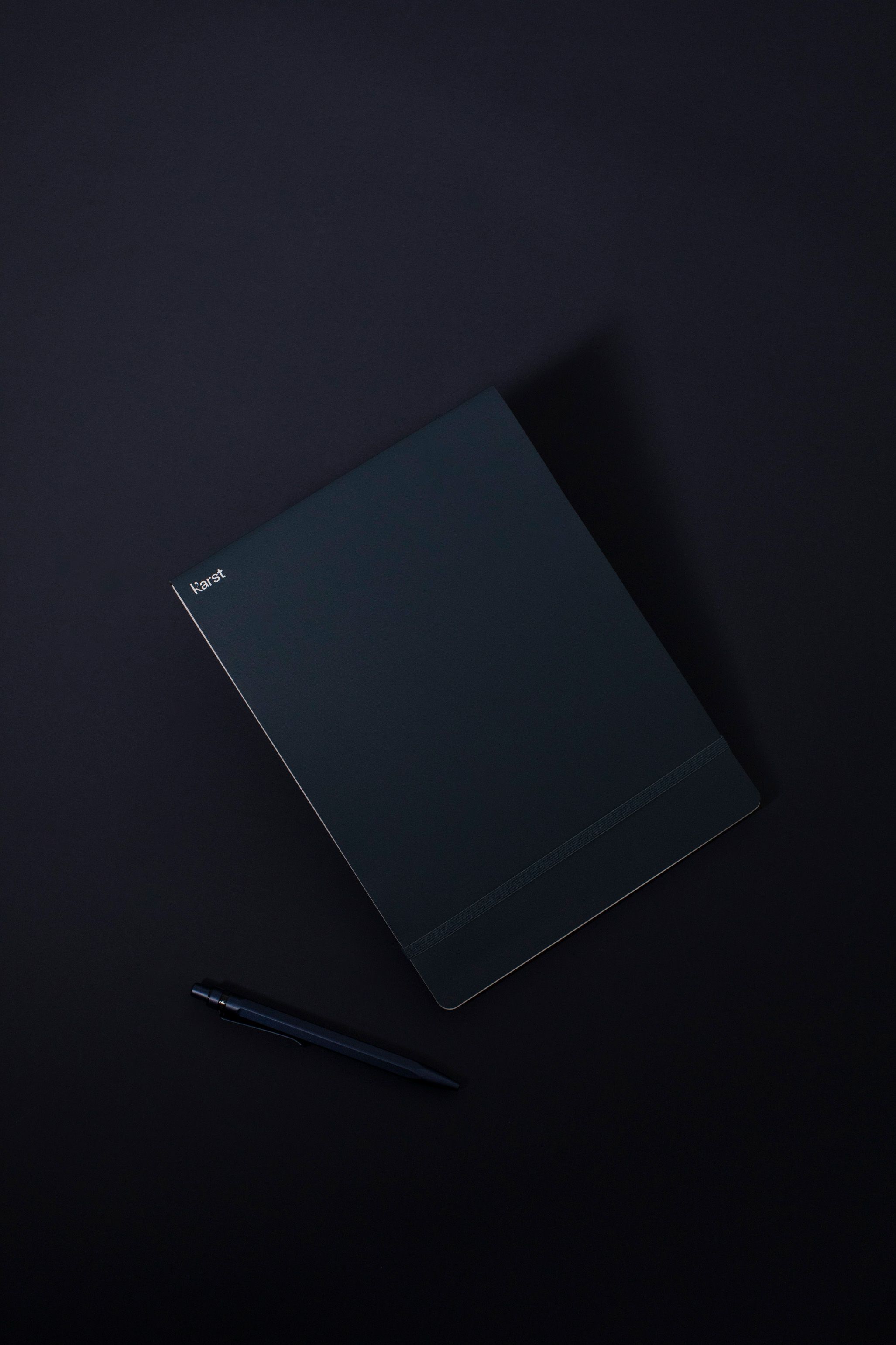 Soft tactile cover and elastic band keep it together on your desk or in your bag. A sticker pack lets you mark what matters before it walks out the door.