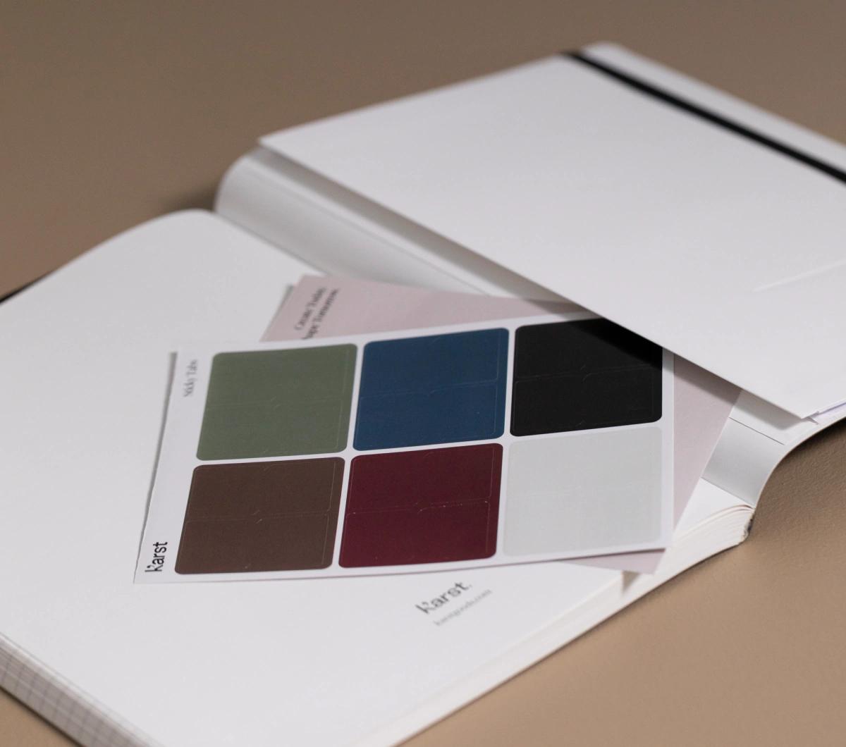 Includes a sheet of sticker tabs and archival labels so you can customise your notebooks for your needs.