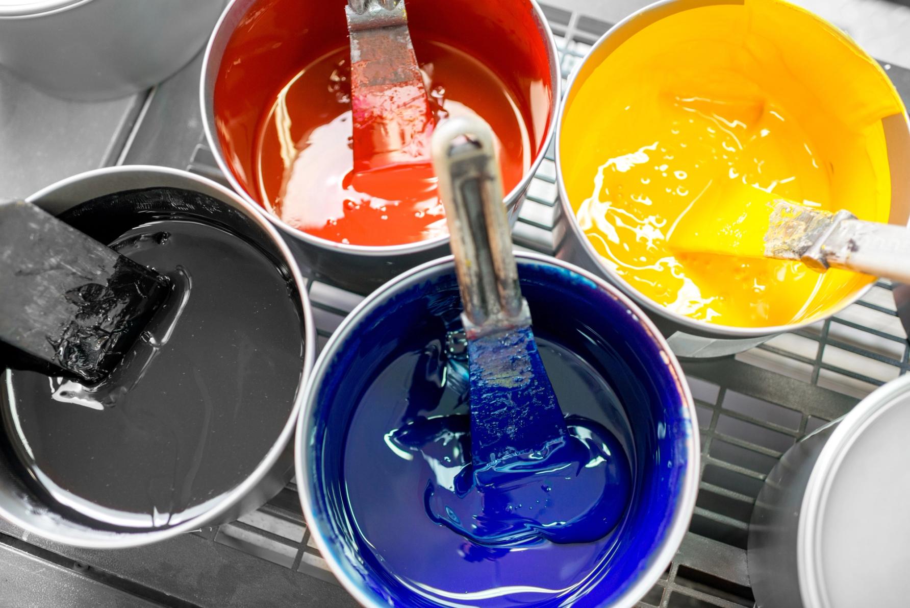 Buckets with CMYK paints