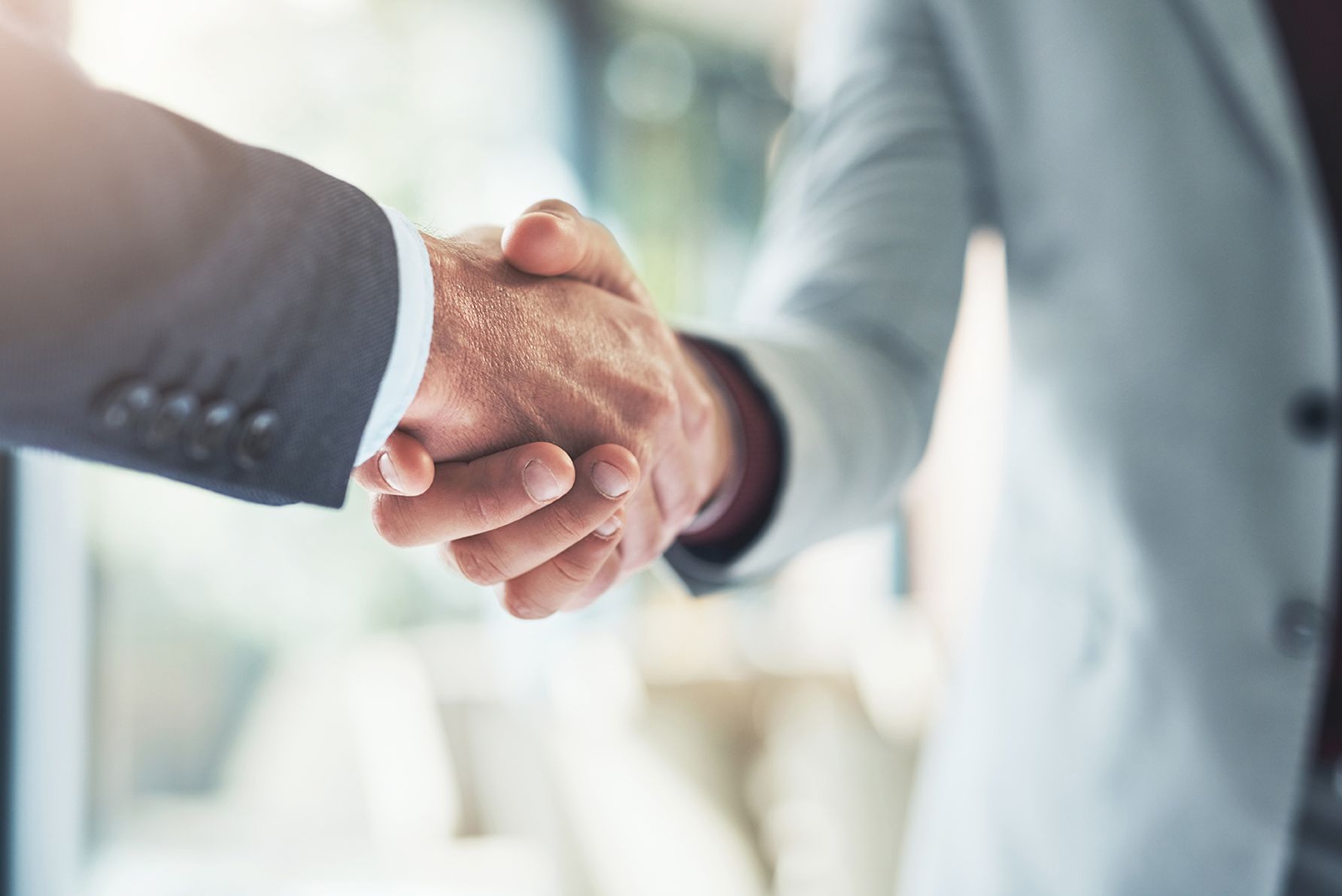 two people shaking hands