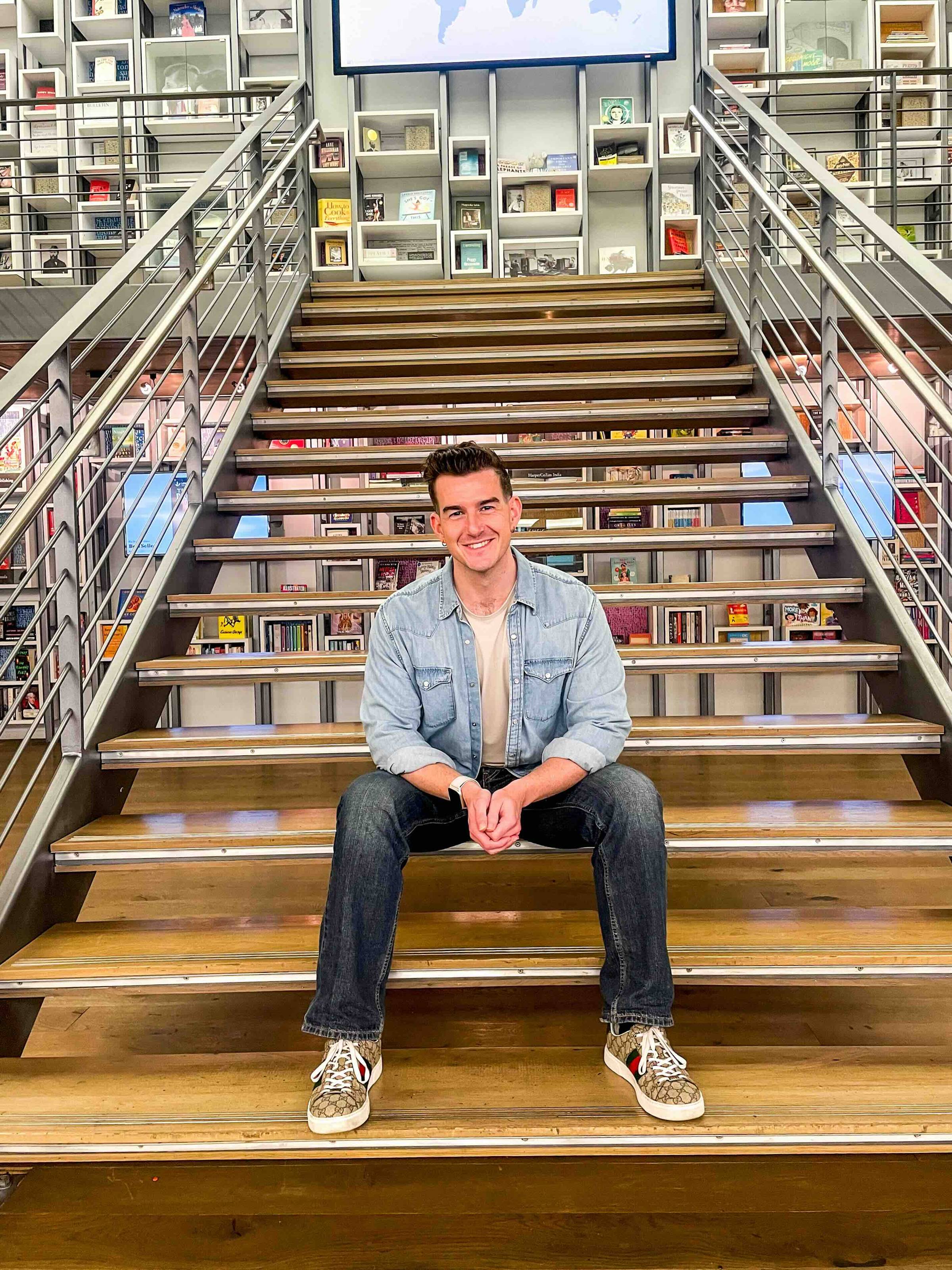 man sitting on staircase