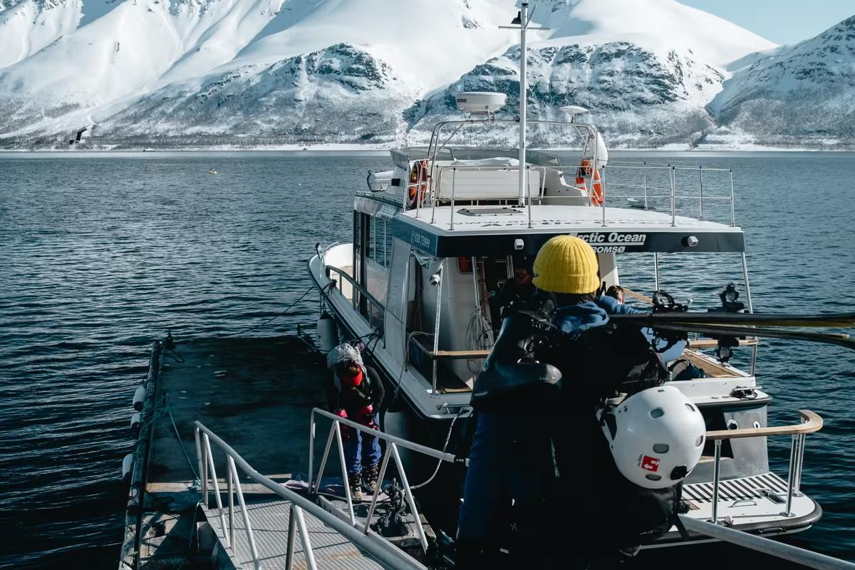 A person boarding a boat