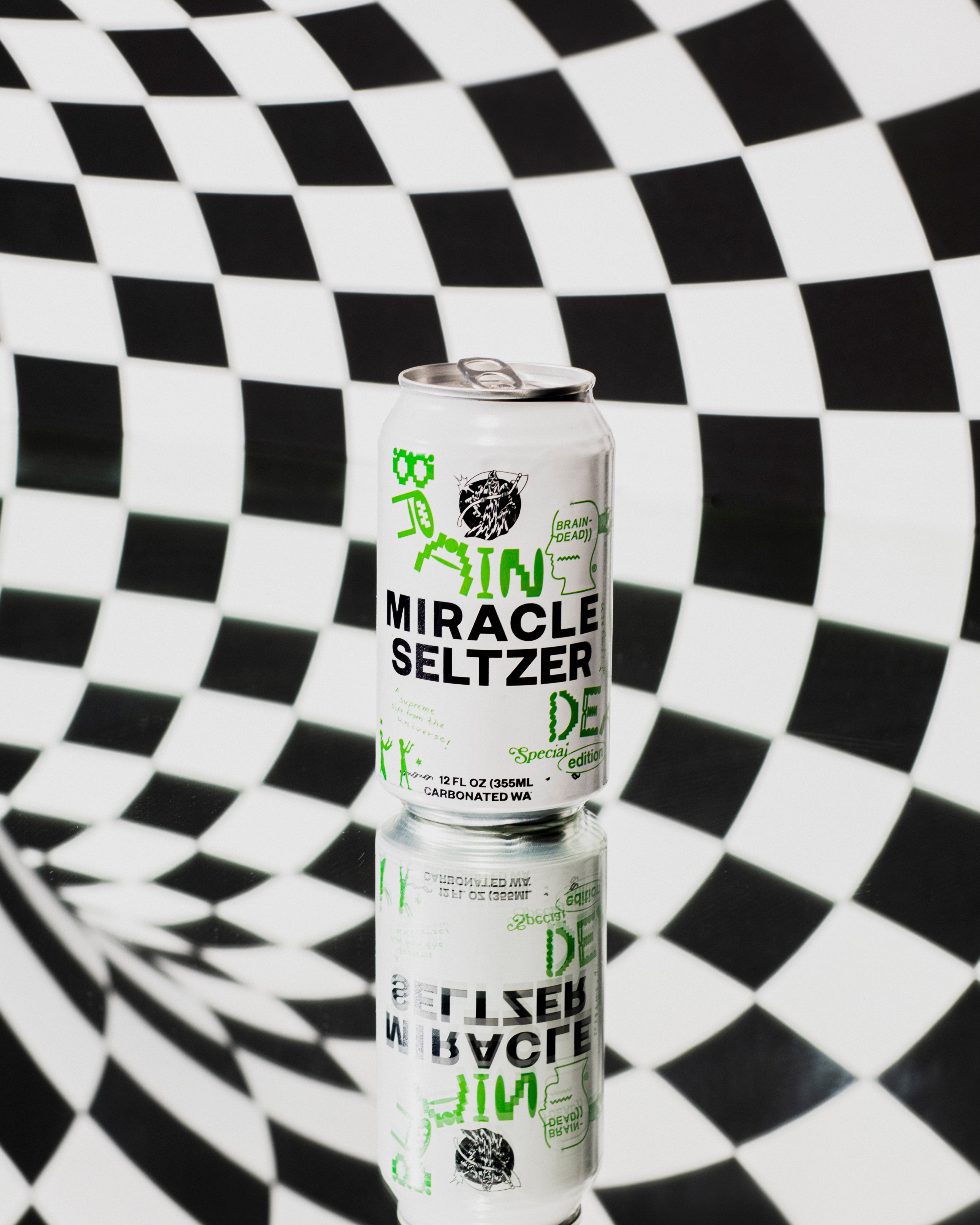 photo of a miracle seltzer can set on an infinity mirror with checkerboard pattern