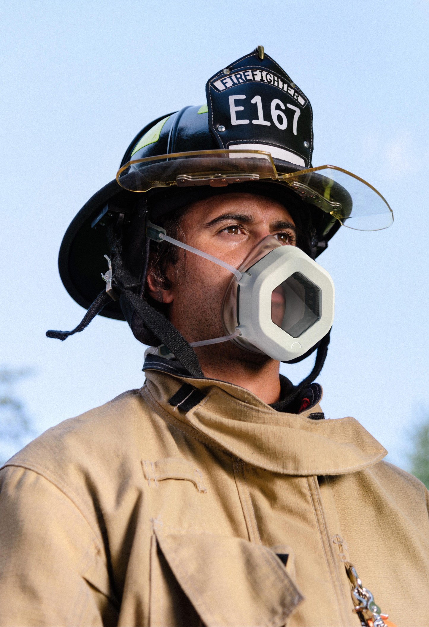 male firefighter wearing a canopy mask