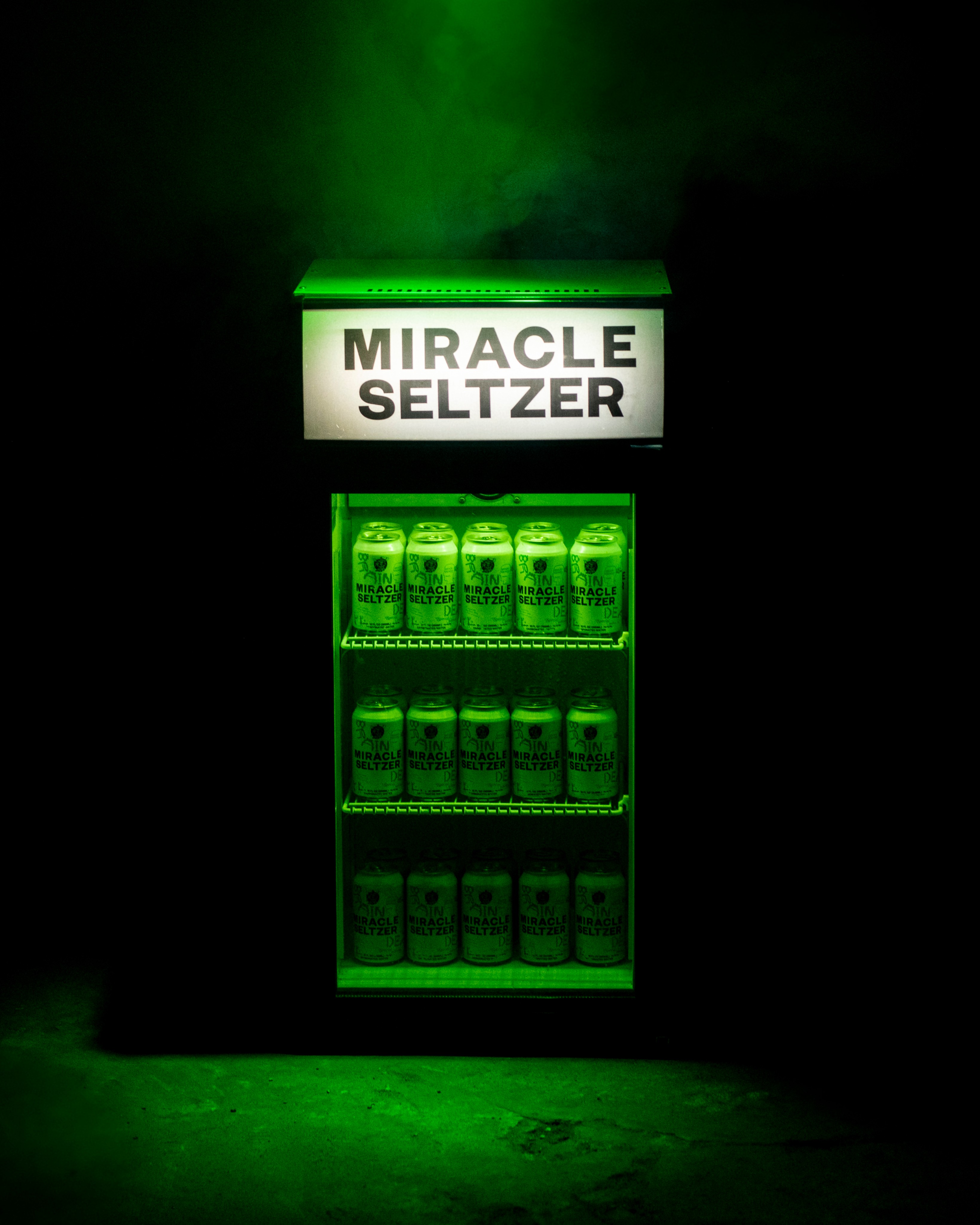 photo of miracle seltzer fridge with fog around it