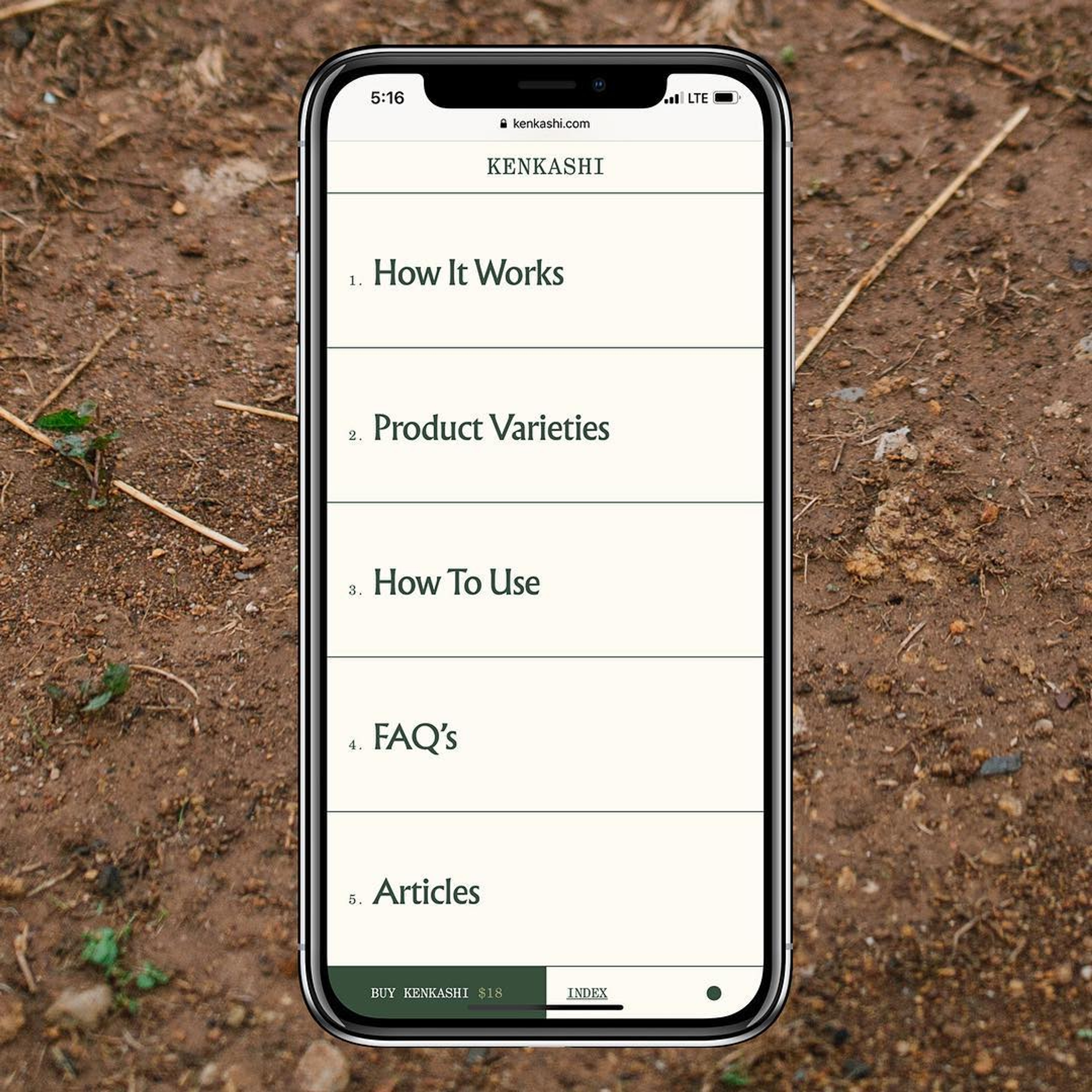kenkashi site menu on mobile set on picture of dirt
