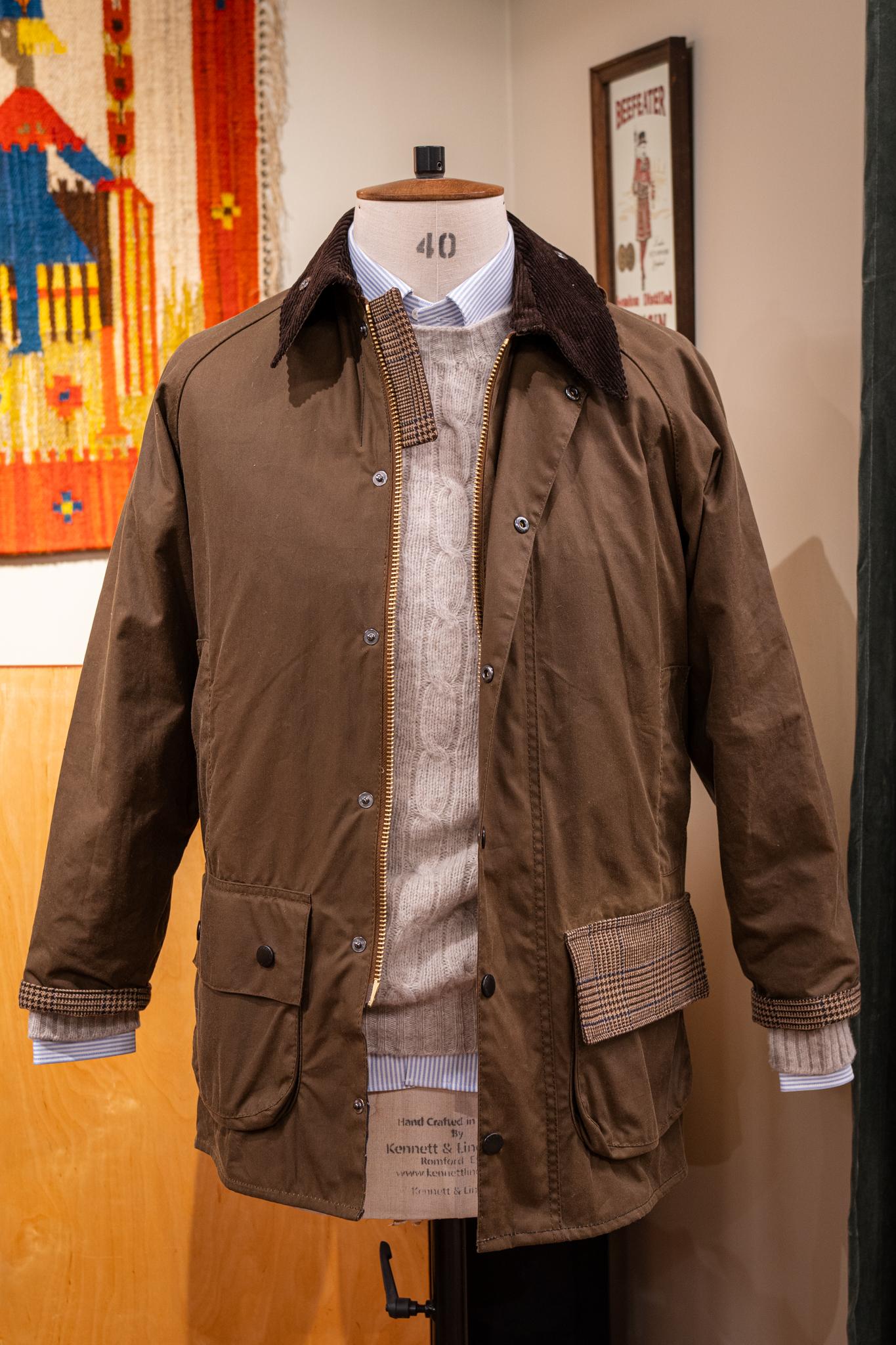 a brown jacket is on a mannequin with the number 40 on it