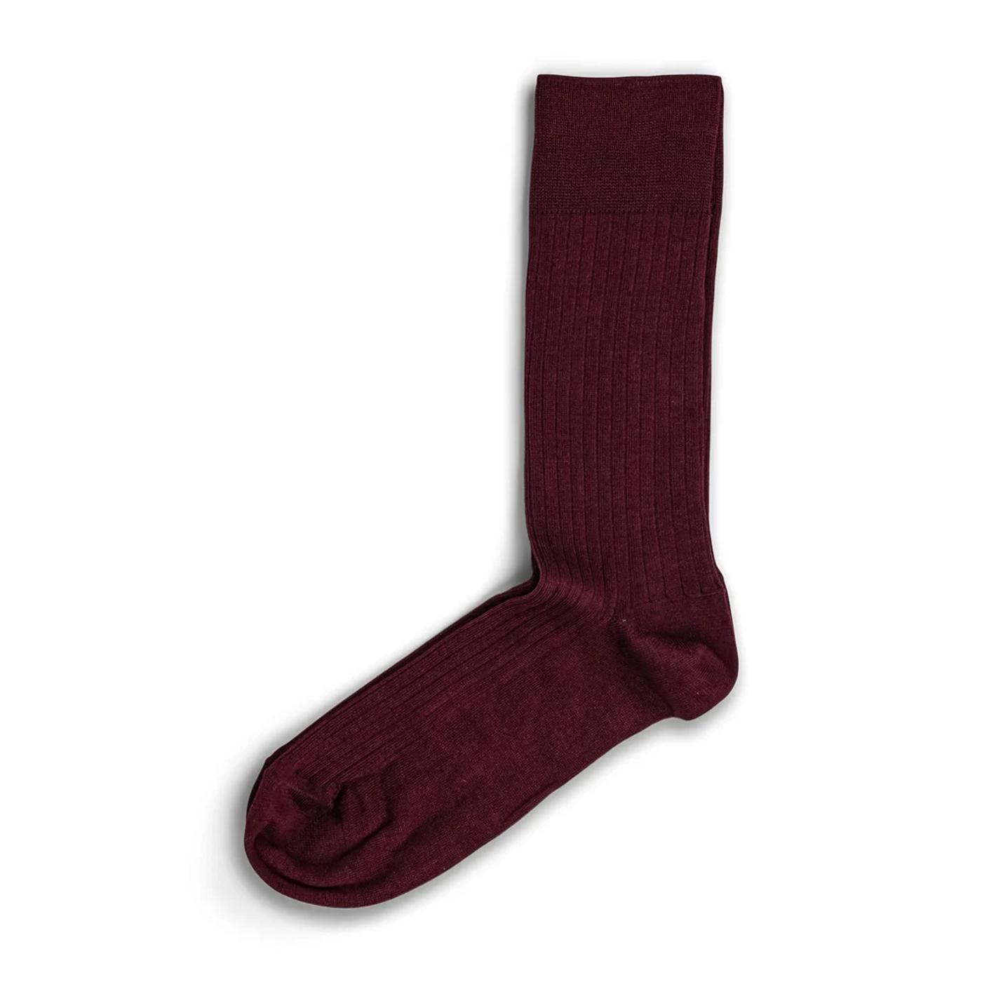 A burgundy ribbed sock.