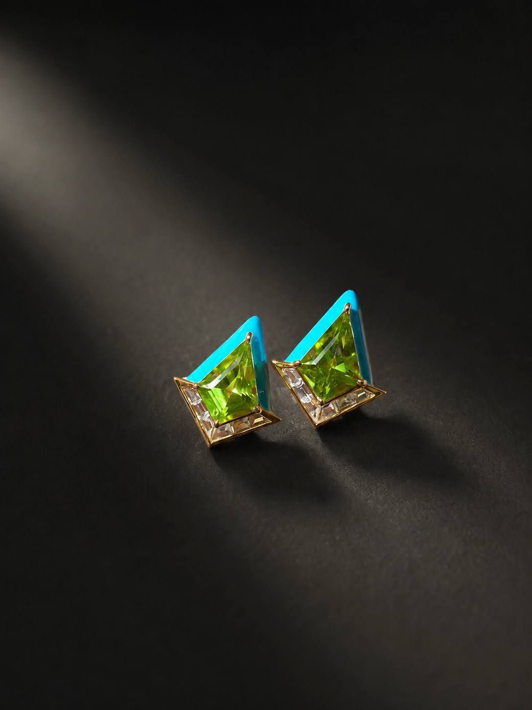 Kite-cut green peridot studs, diamond edges, yellow gold