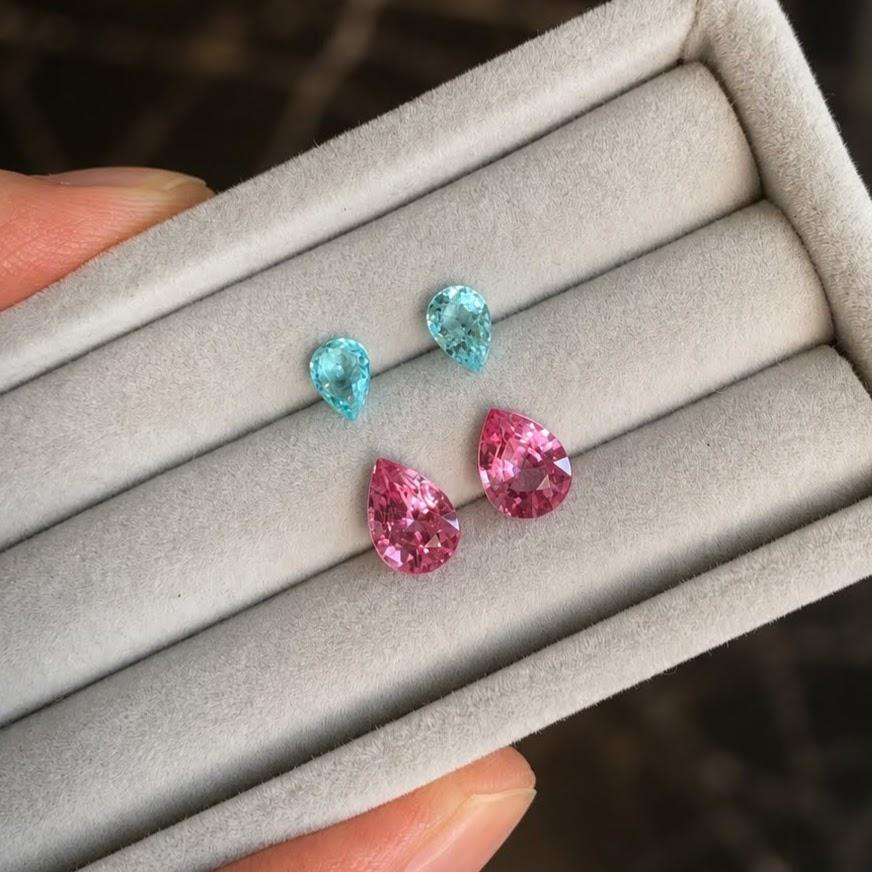 Loose pear-cut Paraíba tourmalines and pink spinels
