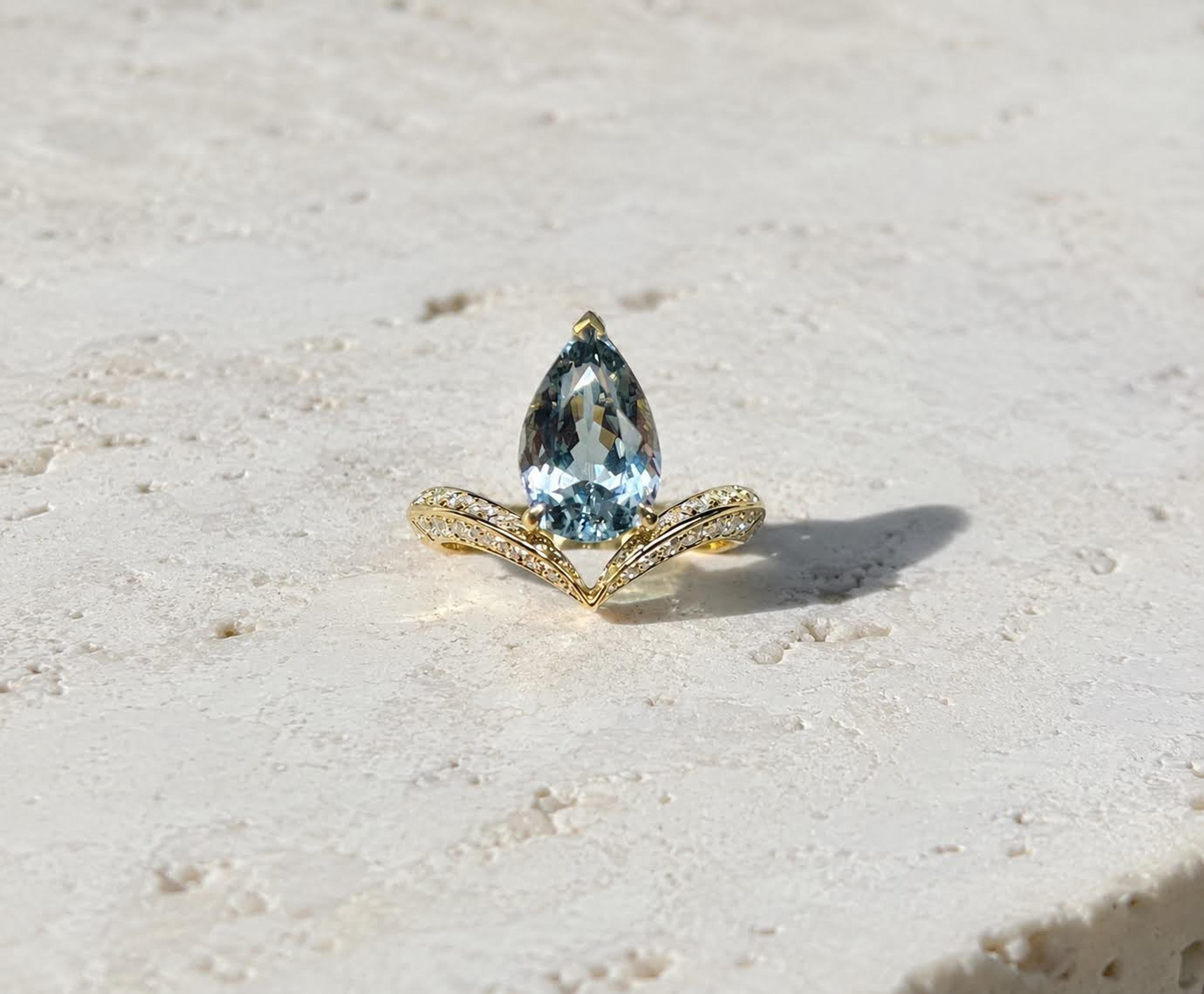 Pear-cut grey-blue spinel, diamond wishbone band, yellow gold