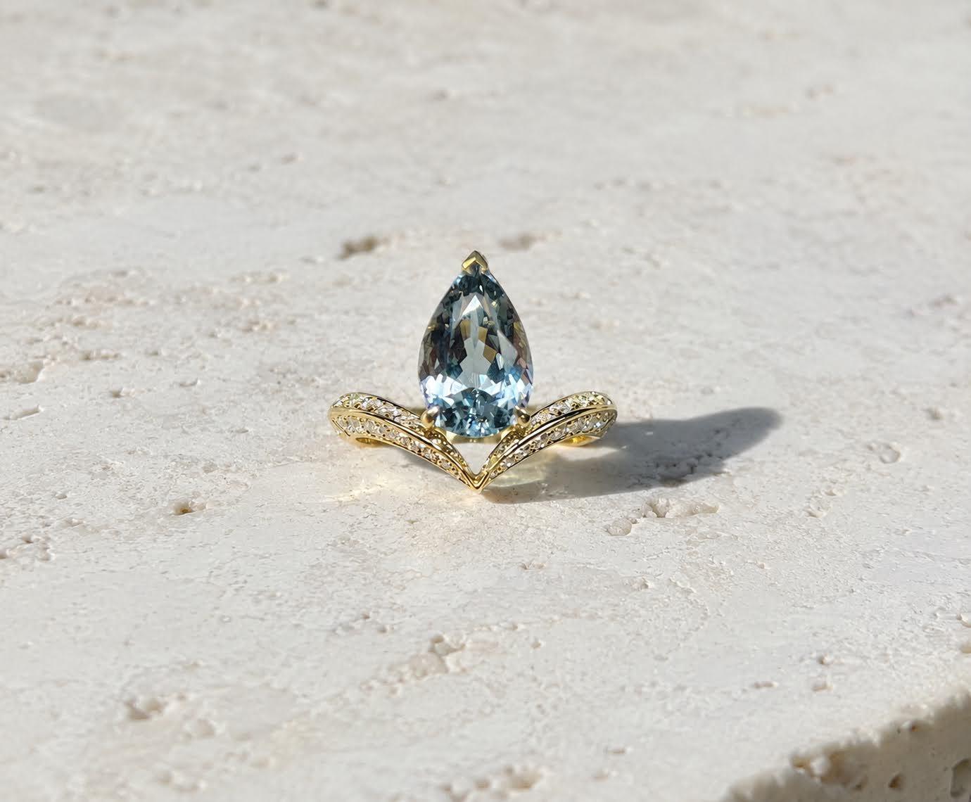 Pear-cut grey-blue spinel, diamond wishbone band, yellow gold