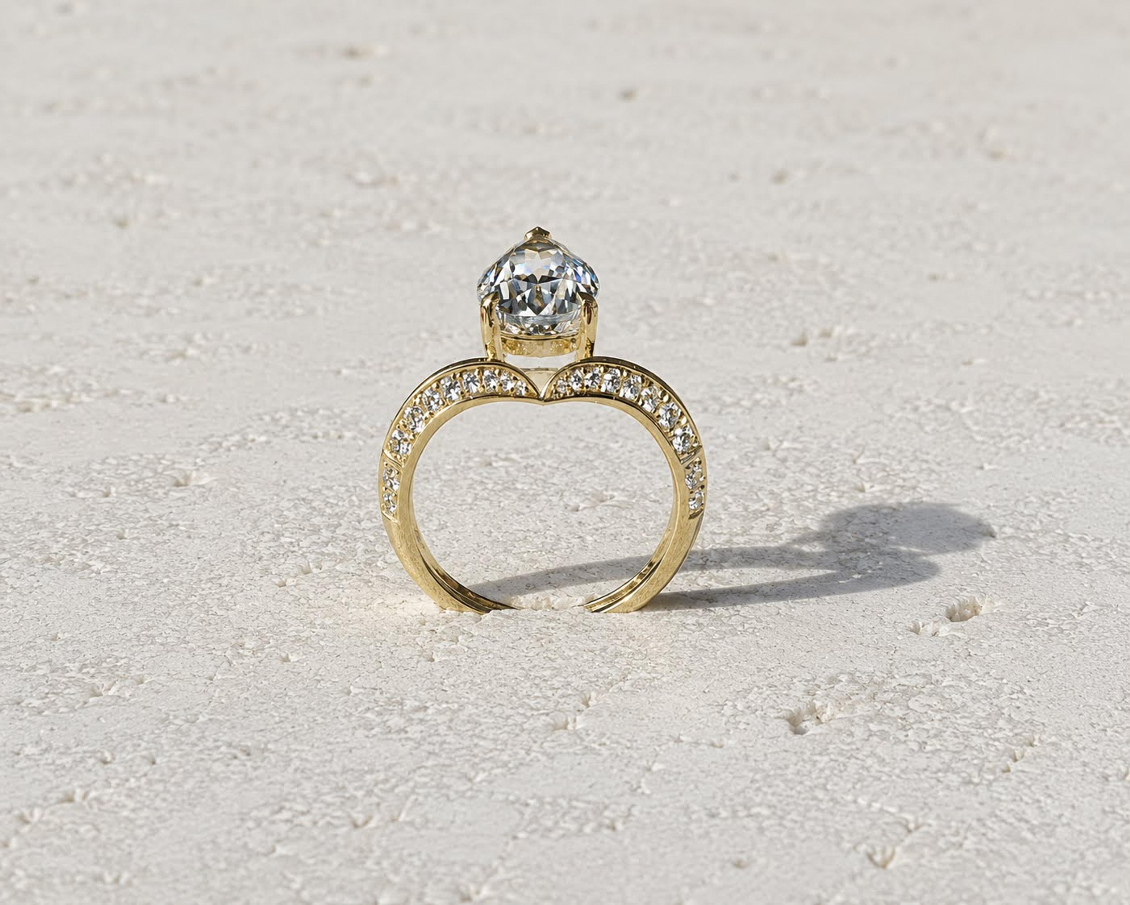 Pear-cut blue spinel wishbone ring, yellow gold, profile