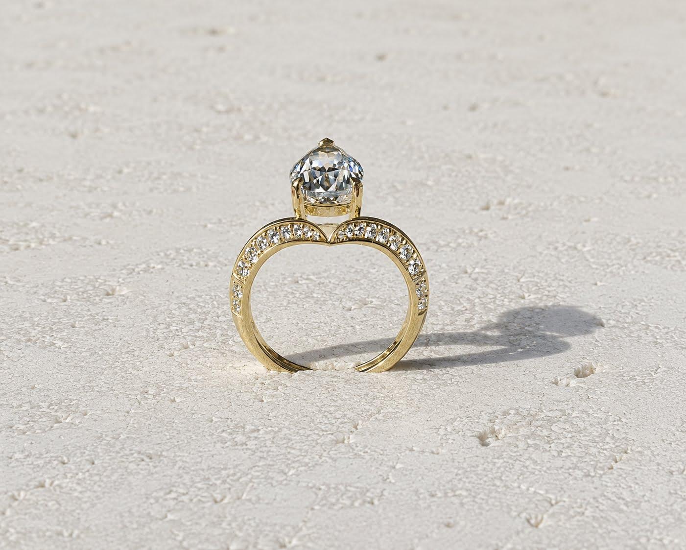 Pear-cut blue spinel wishbone ring, yellow gold, profile