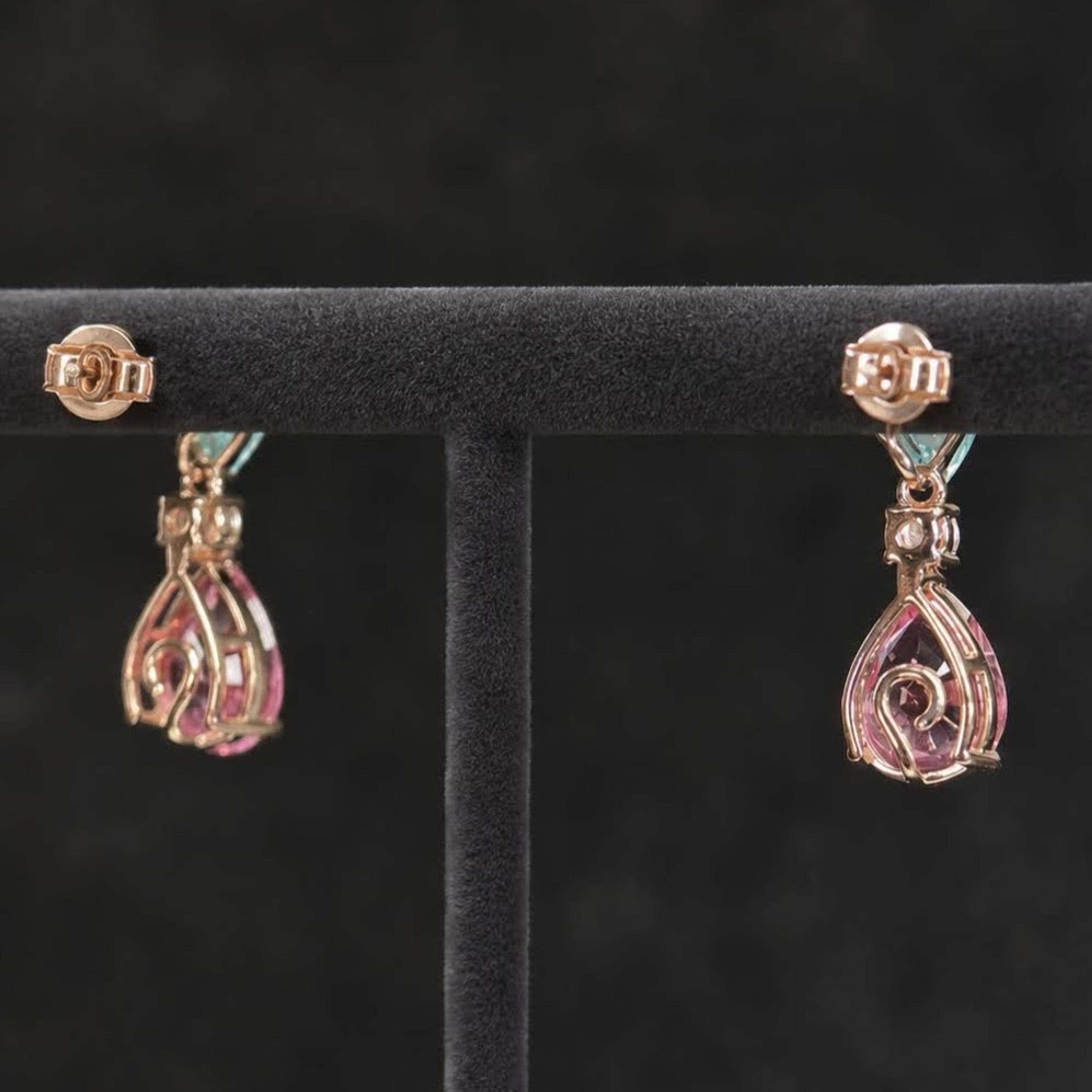 Paraíba and spinel earrings from behind, rose gold