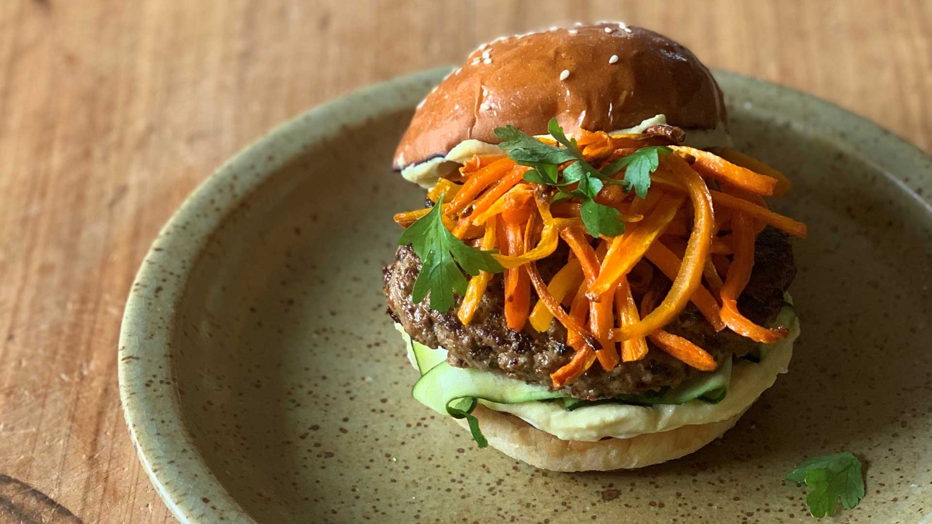 Lamb burger with hummus, courgette ribbons and roasted carrots Recipe | Beef + Lamb New Zealand