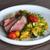 Zaatar Crusted Lamb Rump with Couscous, Tomato, and a Smoky Eggplant Puree