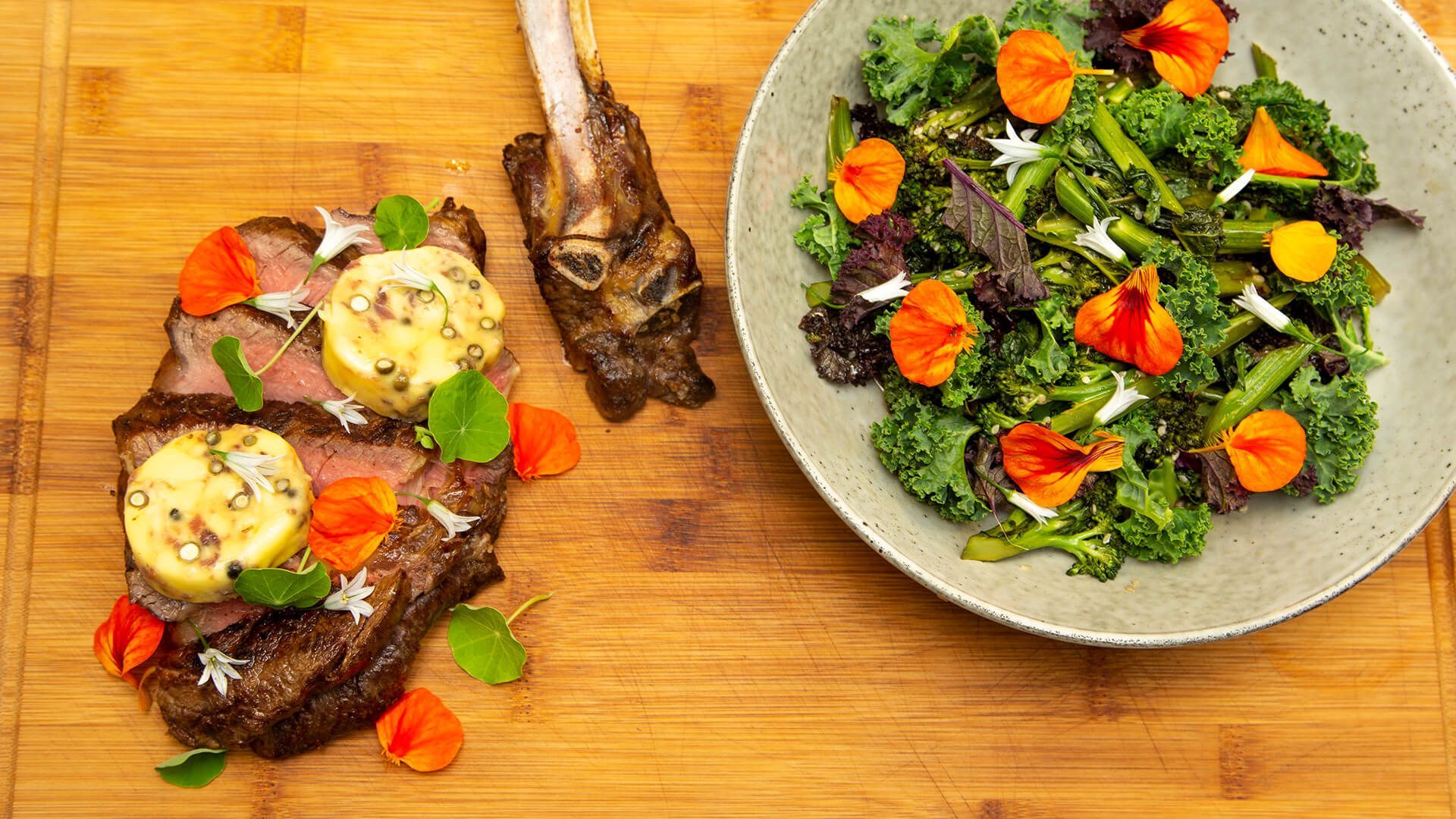 Shared beef tomahawk with compound butter and ponzu tossed greens Recipe | Beef + Lamb New Zealand