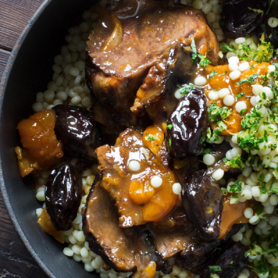 a close up of a plate of food with meat and rice a close up of a plate of food with meat and rice