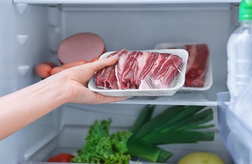 Is it necessary to re-wrap meats before freezing?