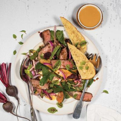 Lamb salad with mint, red onion, lentils served with toasted bread and dressing. Lamb salad with mint, red onion, lentils served with toasted bread and dressing.