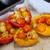 Roast stuffed capsicums with pine nuts, tomatoes, grapes and feta