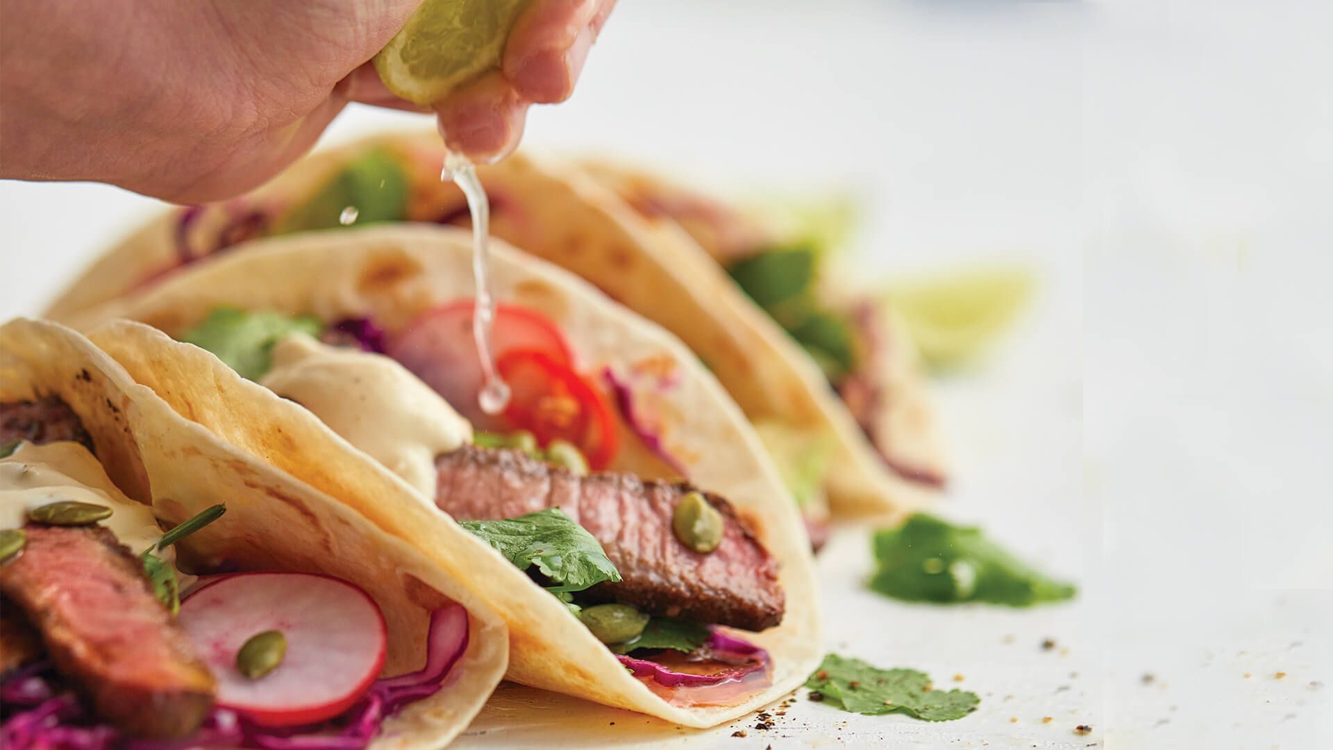 Spicy beef tacos with avocado and lime crema Recipe | Beef + Lamb New Zealand
