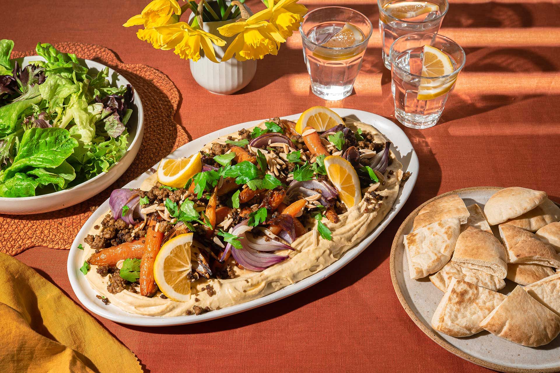 Spiced lamb with red lentil hummus and roasted spring veg Recipe | Beef + Lamb New Zealand