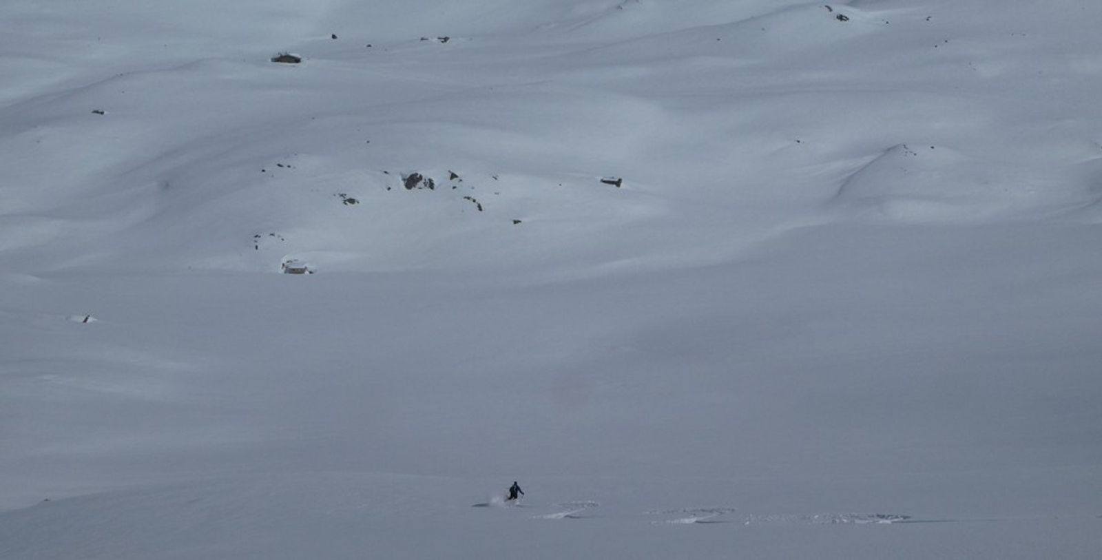 Ski touring on red soil—Toward La Pissine—David makes the most of this pristine powder