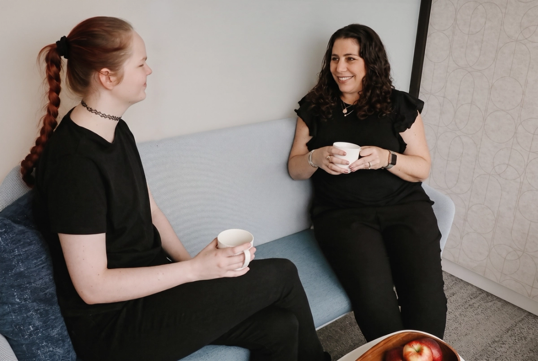 A conversation in the AwareHub lounge