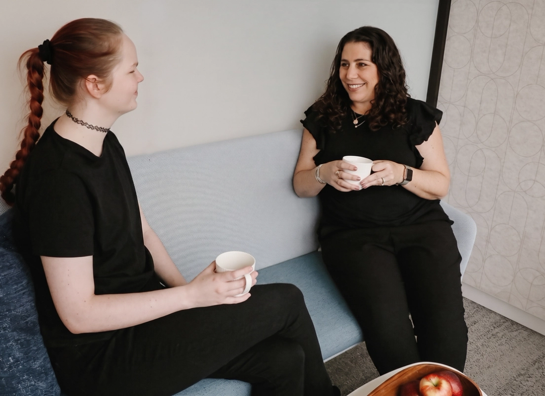 A conversation in the AwareHub lounge