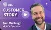Man with short graying hair and beard in a suit jacket on a purple background with white text reading "BigID Customer Story".