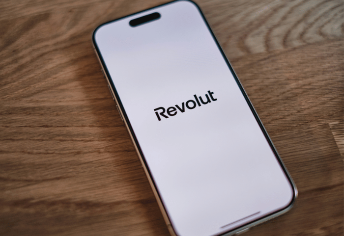 A mobile phone displaying the Revolut name