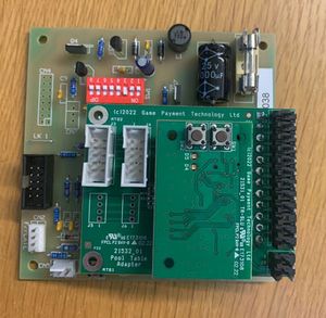 A Game Payment TR-SLU on a pool table control card