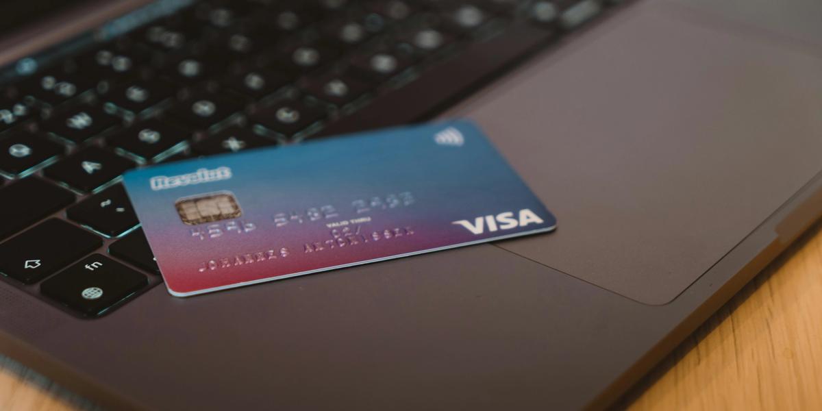 A Visa card on a laptop computer