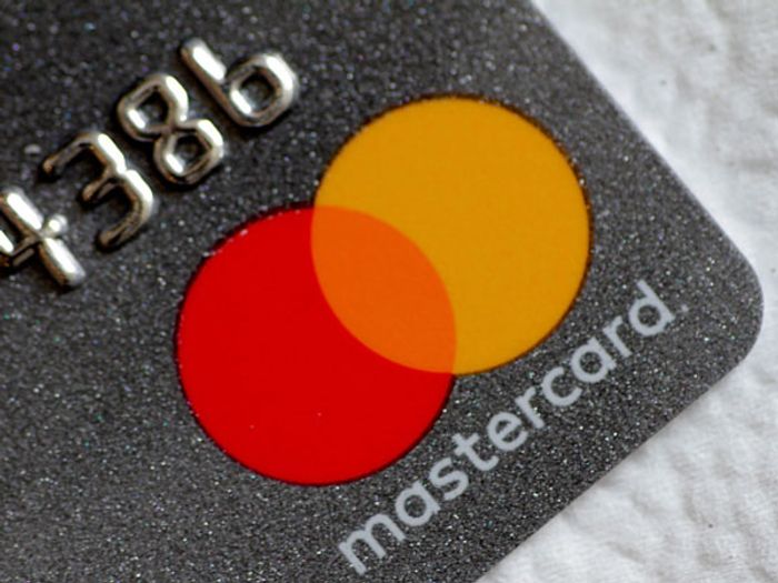 The corner of a Mastercard showing the company logo