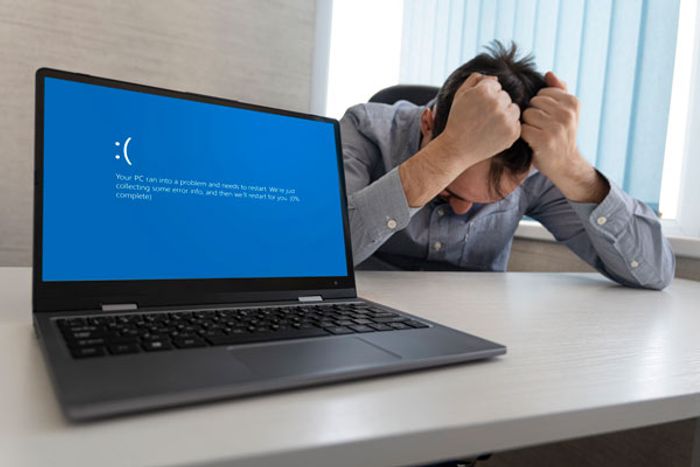 Blue screen of death on a laptop