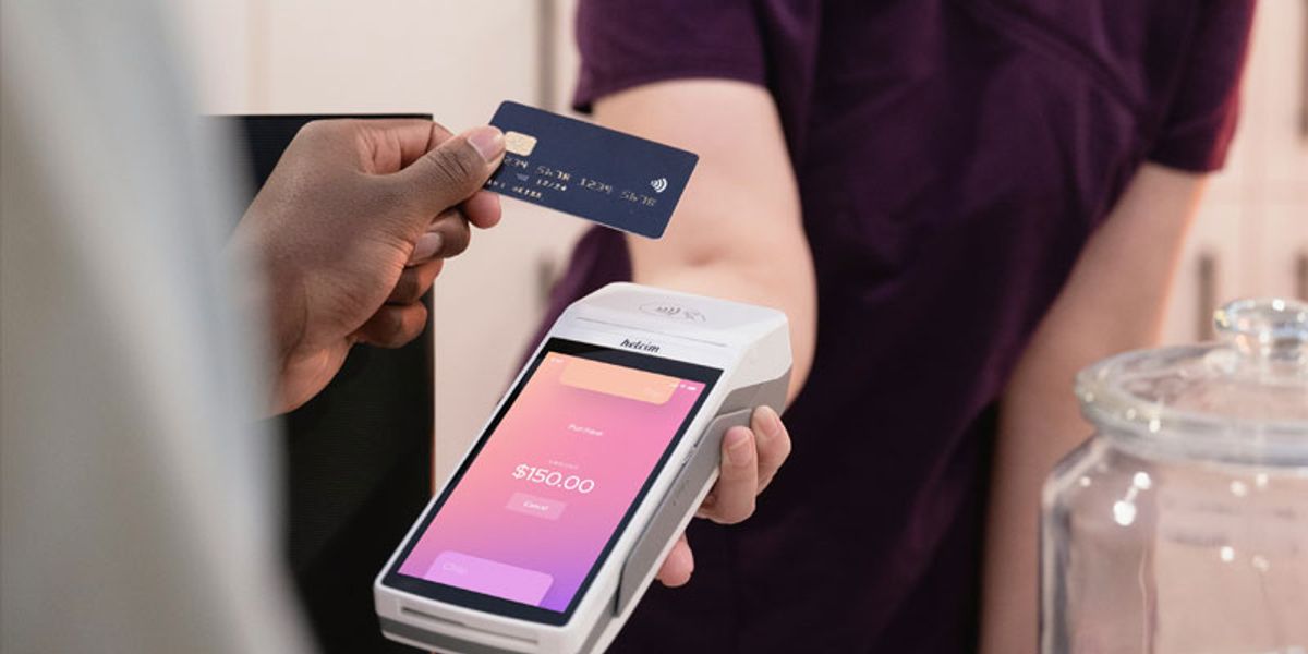 Payment card being tapped on a terminal